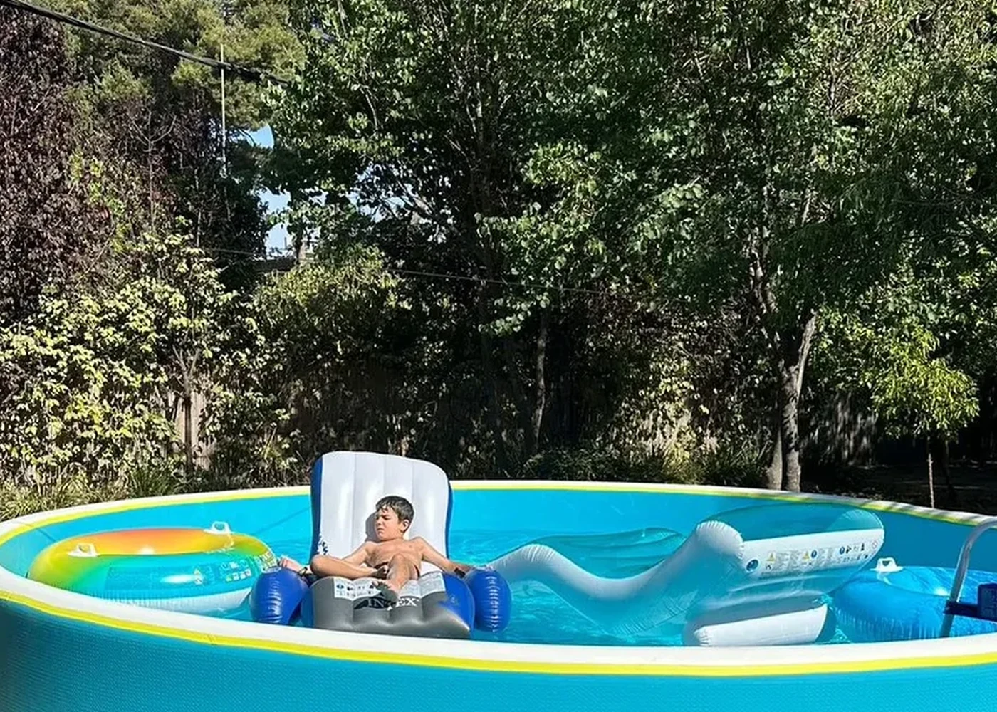Compact seasonal pool installed in a garden